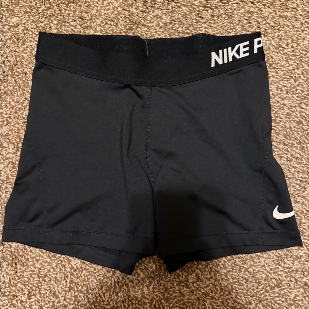 Nike Black Athletic Compression Shorts with White Swoosh